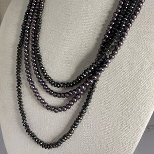 Two long gunmetal gray layering necklaces